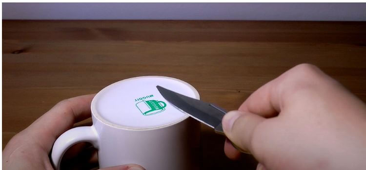 sharping a pocket knife with Ceramic Mug