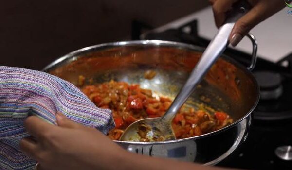 A Cook Uses a Cleaning Towel